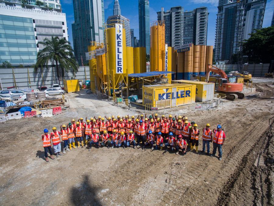 Group shot of entire Keller site team at Conlay Station project in Kuala Lumpur